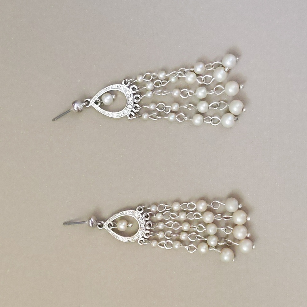 Dangling pearl earrings, about two and a half  inches long